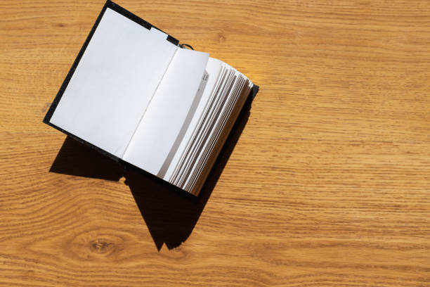 istock Open Holy Bible on a wooden table.Open Holy Bible top view.Religious concept. 2045076070