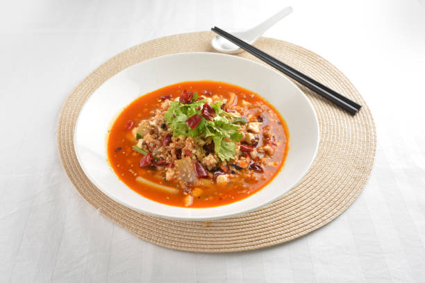 istock stir fried mapo tofu bean curd in spicy mala chilli sauce in plate on white table chinese restaurant asian cafe vegan healthy halal menu 2045080360
