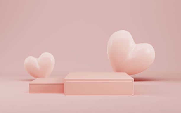 Rectangle podium with hearts for product display on bright cream color background in pastel colors stock photo