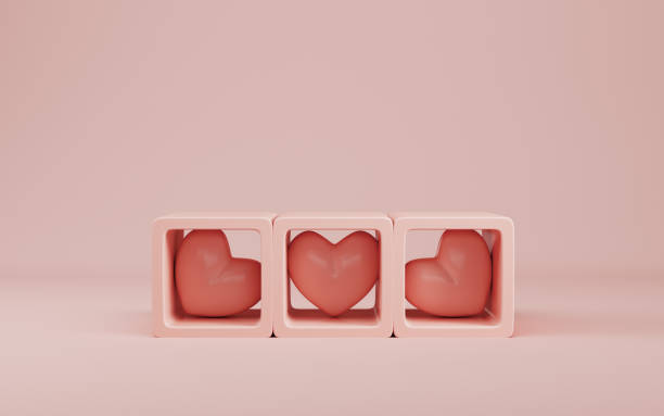 Boxes for product display with hearts on bright cream color background in pastel colors stock photo