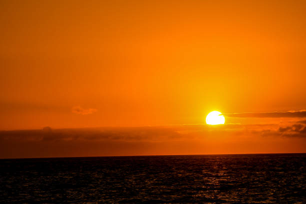 istock The Sun Setting in the Sea 2045100900