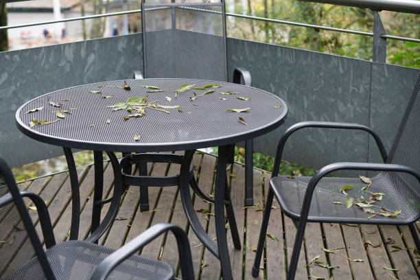 istock Benches and chairs at tables invite you to relax 2045113770