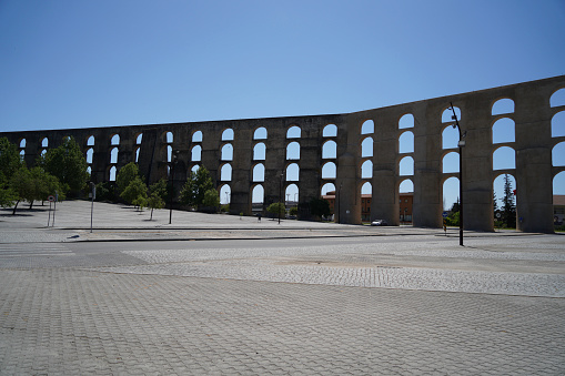 Aqueducts in Portugal are ancient water pipes reminiscent of stone bridges