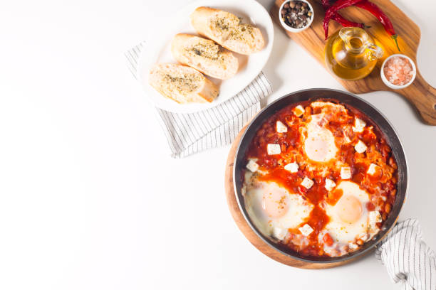 istock Shakshuka made of poached eggs in tomato pepper sauce 2045122592