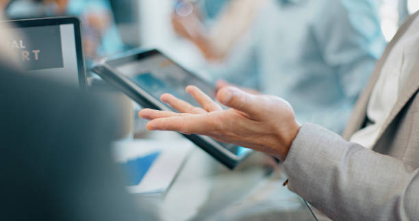 istock Tablet, data analysis or hands of businessman in meeting for online analytics, planning or project management. Research, closeup or team collaboration on tech for communication, feedback or review 2045136775