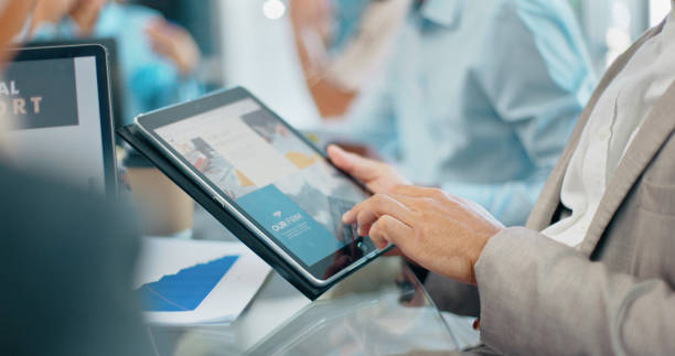 istock Tablet, data analytics or hands of businessman in meeting for online info analysis, planning or project management. Research, closeup or team collaboration on tech for insight, feedback or review 2045136973