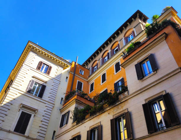 Modern architecture intertwined seamlessly with the ancient, reflecting Rome's ability to evolve while preserving its heritage. Glass-fronted structures and contemporary designs nestled harmoniously beside centuries-old churches and palaces.