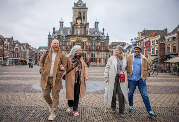 istock Two middle aged diverse couples on staycation in Delft 2045179502