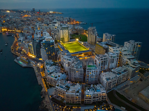 Sliema city and apartments, buildings, sea. Malta island, drone view