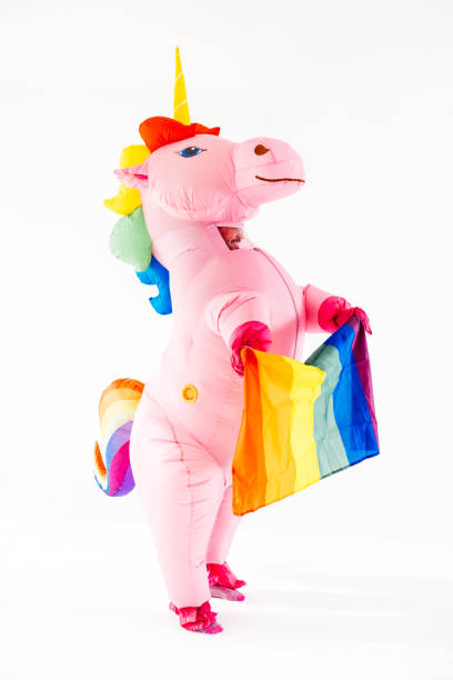 istock Unicorn with LGBT flag standing in studio 2045183740