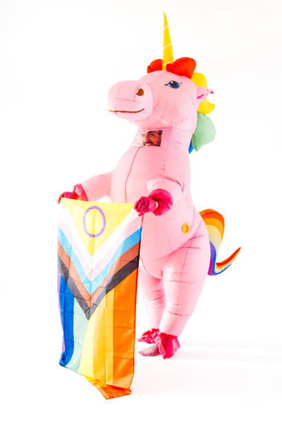 istock Pink inflatable unicorn holding rainbow flag 2045186400