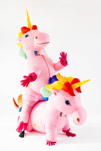 istock Unicorns in rainbow costume with piggyback 2045186427
