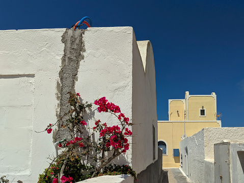 Santorini church bell tower and dome in Oia on Greece