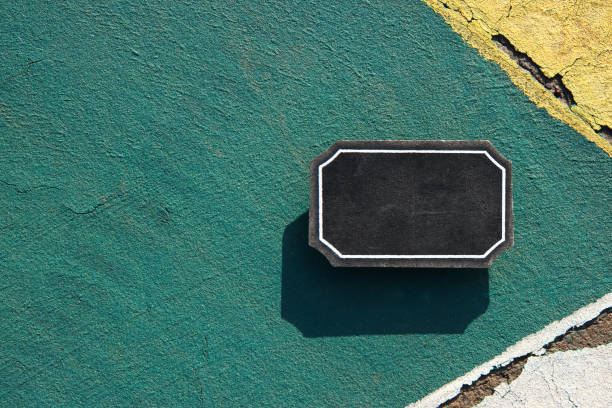 Top view image of empty blackboard sign on textured floor