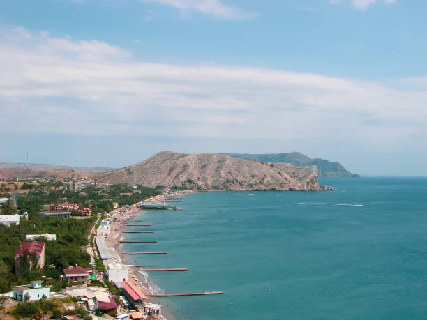 istock The blue bay with a pier for yachts. 2045244278