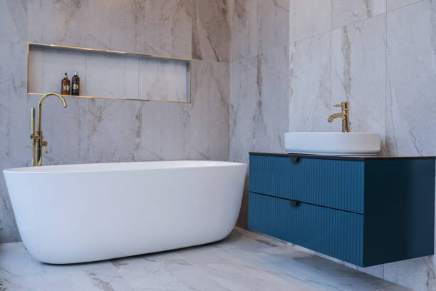 istock White Bathtub, Gold Modern Faucet And Luxury Bathroom Image 2045276962