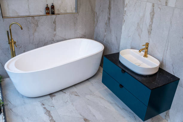istock White Bathtub, Gold Modern Faucet And Luxury Bathroom Image 2045278035