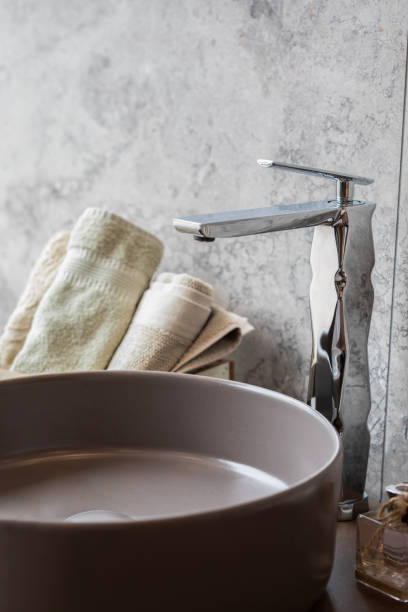 istock Luxurious And Modern Faucet On The Bathroom Sink 2045279649