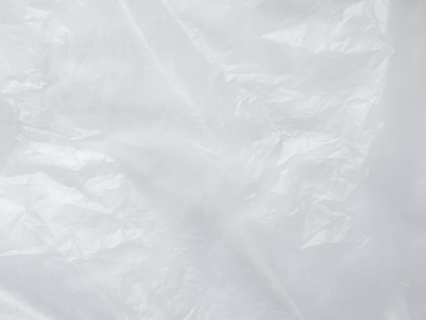 istock Plastic Paper Foil Silver Crumpled Wrap Film Cellophane White Background Package Pattern Sheese Bag Pvc Frame Stretch Tape Round Clean, Moden Packaging Polythene Surface Mockup Eco Environment. 2045295502