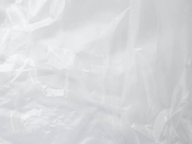 istock Plastic Paper Foil Silver Crumpled Wrap Film Cellophane White Background Package Pattern Sheese Bag Pvc Frame Stretch Tape Round Clean, Moden Packaging Polythene Surface Mockup Eco Environment. 2045295503