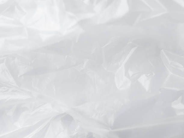 istock Plastic Paper Foil Silver Crumpled Wrap Film Cellophane White Background Package Pattern Sheese Bag Pvc Frame Stretch Tape Round Clean, Moden Packaging Polythene Surface Mockup Eco Environment. 2045296046