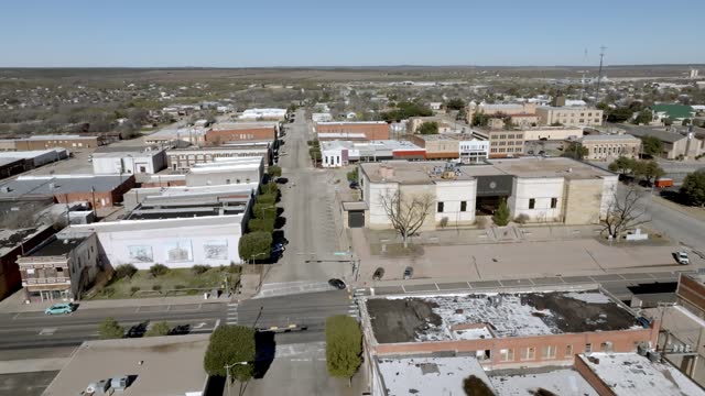 Downtown Sweetwater, Texas with drone video moving down.
