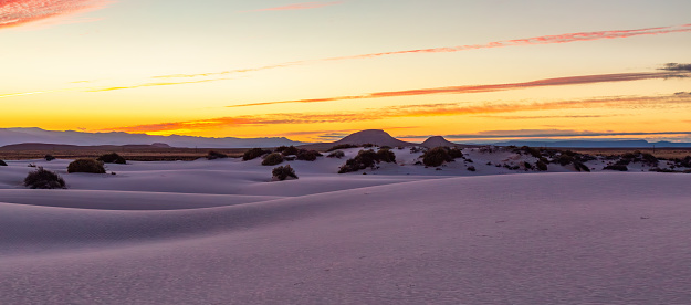 White sand during a colorful sunrise. White Sands National Monument, New Mexico, United States.