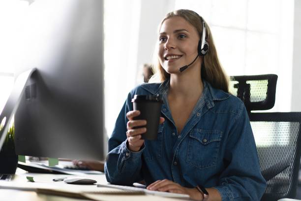 istock Young friendly operator woman agent with headsets working in a call center. 2045407719