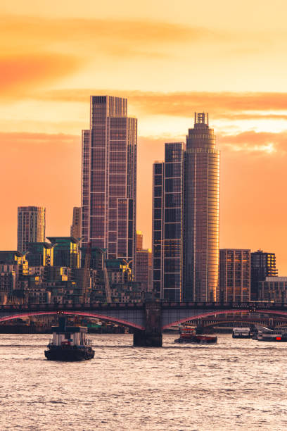 view of the st george wharf area illuminated by a beautiful sunset - london england apartment uk real estate fotografías e imágenes de stock