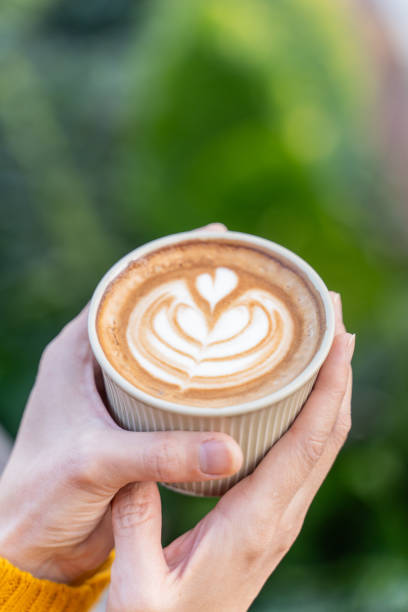 istock beautiful Latte art coffee with hot milk 2045443897
