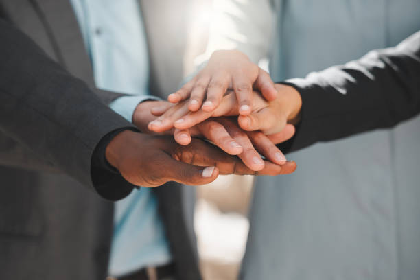 istock ​​Business, people and hands together for teamwork, support or collaboration with company goals, success and mission. Employees or professional group in circle with stack for target and staff power 2045519714