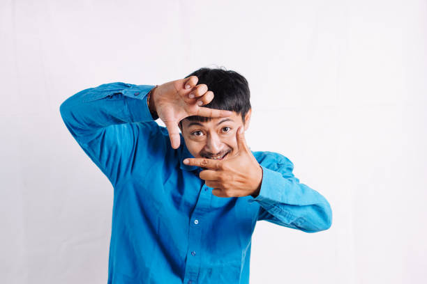 Portrait of a mid adult photographer at his home office