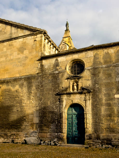 istock Ancient historic stone church exterior with bell tower in Arles 2045549029
