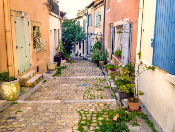 istock Empty narrow street with old houses in Arles 2045554803