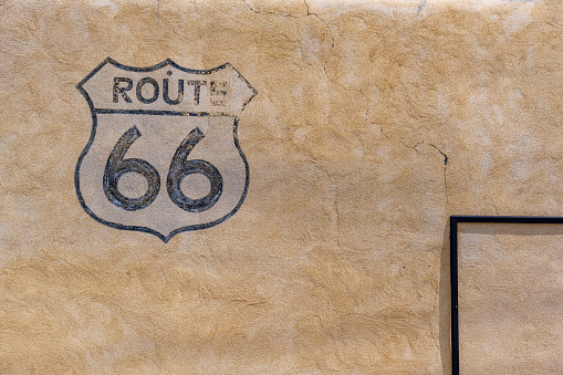 U.S. Route 66 highway, with sign on asphalt on Missouri.