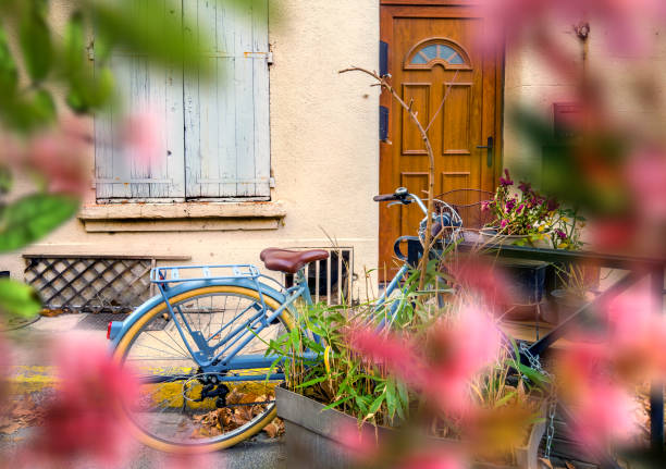 Architectural exterior details from narrow street of ancient city Arles in France