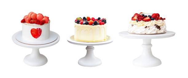 istock White beautiful cakes with strawberry, raspberry and blueberry, white background, isolated, close up png 2045567534