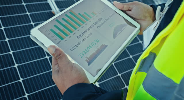 Solar panels, engineering hands and tablet screen for data analytics of eco friendly heating or energy saving stats. Person on digital technology, photovoltaic grid and graphs, infographics or charts