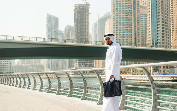 istock arab man walking on dubai marina 2045587702