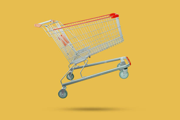 shopping cart isolated on yellow background