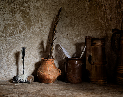 terracotta pots, feathers, quills, rustic, past times.