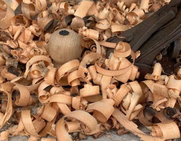 istock Close-up image of wood shavings after working with a plane. 2045652492