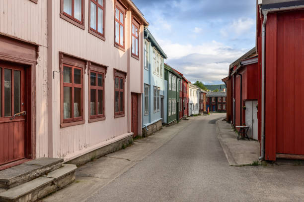 istock Historical Norwegian architecture stands out in this quiet Roros lane, where pastel-colored facades blend with the tranquil Nordic atmosphere 2045688001
