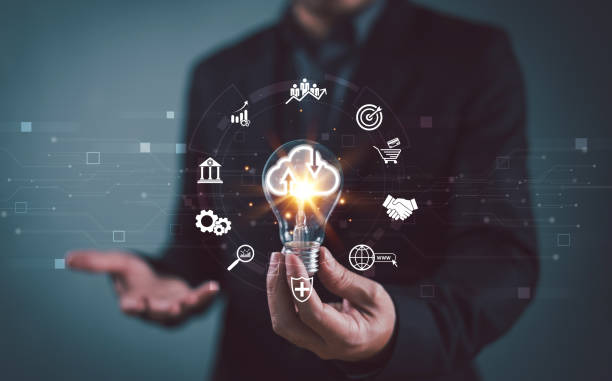 istock Businessman with light bulb, computer laptop, solution connection concept. Business cloud technology infographic on hand. Global internet application, digital marketing, Financial Ai tech, big data 2045706926