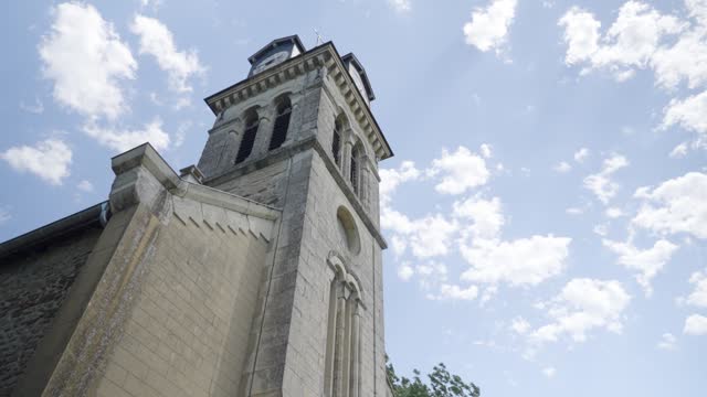 Panning shot upwards church Saint Pierre, Saint Just Chaleyssin in Isere department in southeastern France