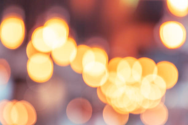 Bokeh background of coffee shop with light bokeh.