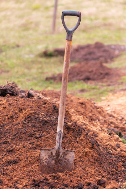 istock Shovel on the ground in the garden. Selective focus 2045748502