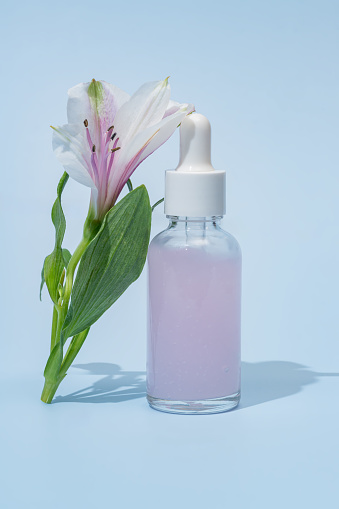Dropper glass Bottle Mock-Up. Body treatment and spa. Natural beauty products. Eco serum, skin care blank bottle. Anti-age massage oil. Oily cosmetic pipette.