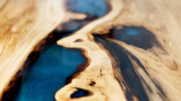 istock Abstract background a combination of wood texture and blue resin 2045786472