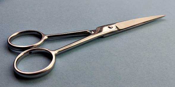 Black handled scissors on a white background. File contains clipping path.